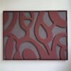 Handmade sculptural 3D wall art in organic red and grey tones with flowing abstract shapes and textured relief design.